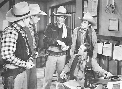 John Bagni, Sammy Baugh, Howard Hughes, Kermit Maynard, and William Kellogg in King of the Texas Rangers (1941)