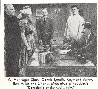 Raymond Bailey, Carole Landis, Charles Middleton, Ray Miller, and C. Montague Shaw in Daredevils of the Red Circle (1939
