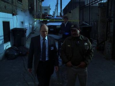 Marc Vann and Larry Mitchell in CSI: Crime Scene Investigation (2000)