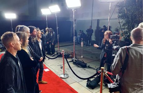 Kyra Gardner interviews the Foo Fighters at the red carpet premiere of their horror comedy 