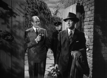 Ray Milland and Lester Matthews in Ministry of Fear (1944)
