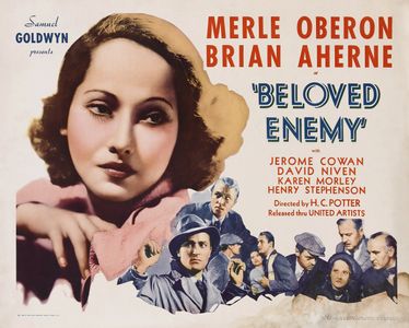 David Niven, Brian Aherne, Jerome Cowan, Donald Crisp, Karen Morley, Merle Oberon, and Henry Stephenson in Beloved Enemy