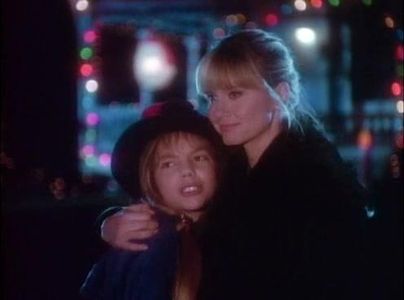 Olivia Newton-John and Juliet Sorci in A Mom for Christmas (1990)