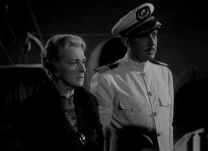 Gladys Cooper and Lester Matthews in Now, Voyager (1942)