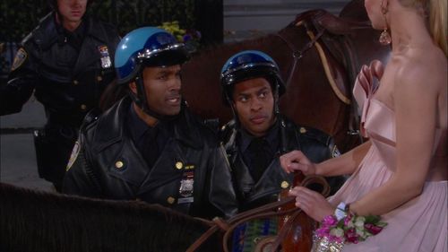 Donnell Turner and Beth Behrs in 2 Broke Girls (2011)