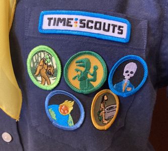 Myth Creation, Prehistoric Pet Care, Crypt Management, Extinction Preparedness, Paleolithic Fitness. Join the TIME SCOUT