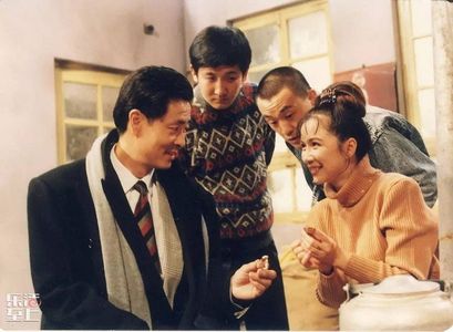 Bing He, Cunxin Pu, Tian Liang, and Ming Cai in I Love My Family (1993)