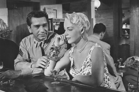 Richard Conte and Mary Beth Hughes in Highway Dragnet (1954)
