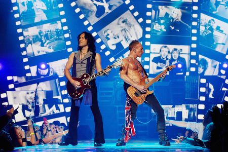 Vivian Campbell, Phil Collen, and Def Leppard in Def Leppard Viva! Hysteria Concert (2013)