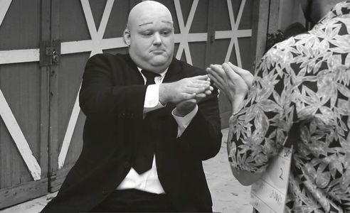 playing ALFRED HITCHCOCK