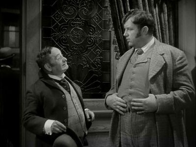 Eddie Collins and Andy Devine in In Old Chicago (1938)