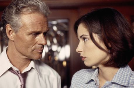 Michael Des Barres and Megan Edwards in Poison Ivy: The New Seduction (1997)