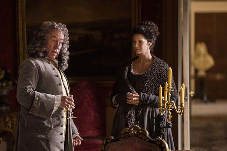 Simon Callow and Caitríona Balfe in Outlander (2014)