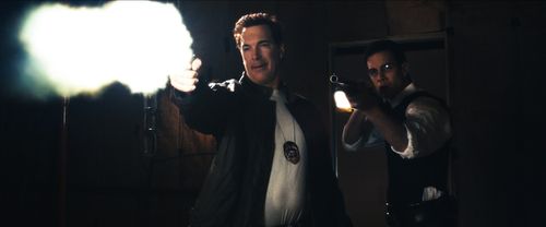 Brett Simmons and Patrick Warburton in The Action Hero's Guide to Saving Lives (2009)