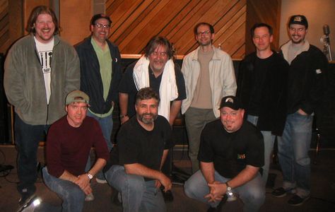 Top row, John DiMaggio, Brian Sheesley, Matt Groening, David X. Cohen, Rich Moore, James Purdum, Bottom row, Billy West,
