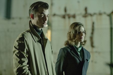 Jack Bannon and Emma Paetz in Pennyworth (2019)
