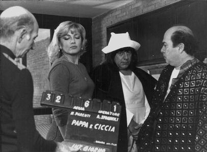 Lino Banfi, Milly Carlucci, and Paolo Villaggio in Pappa e ciccia (1983)