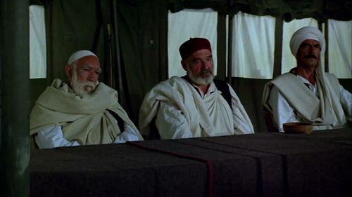 Anthony Quinn, Robert Brown, and Takis Emmanuel in The Lion of the Desert (1980)