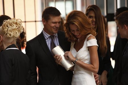 Bailey Chase and Hilarie Burton in White Collar (2009)