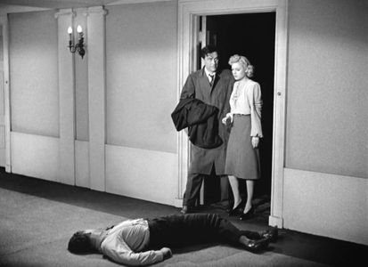 Ray Milland, Carl Esmond, and Marjorie Reynolds in Ministry of Fear (1944)