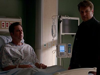 Jonathan Silverman and Nathan Fillion in Castle (2009)