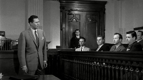 Barney Martin and Anthony Quayle in The Wrong Man (1956)