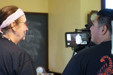 Director, Gigi Bannister, sets a shot on 16MM and HD Video, with DP Christopher Nunez on set of Schrodinger's Cat.