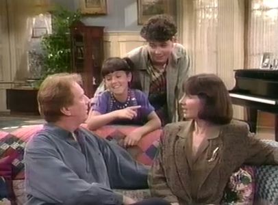 Jeffrey Jones, Jaclyn Bernstein, Mary Gross, and Chance Quinn in The People Next Door (1989)