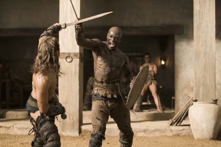Peter Mensah and Dustin Clare in Spartacus: Gods of the Arena (2011)