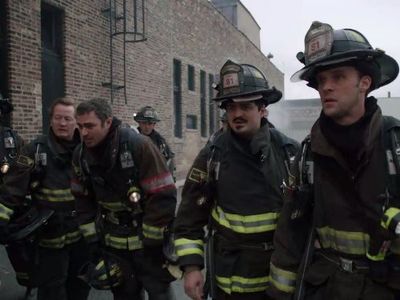 Jesse Spencer, Christian Stolte, Taylor Kinney, and Yuriy Sardarov in Chicago Fire (2012)
