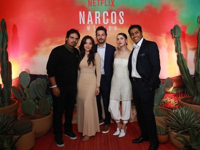 Michael Pena, Teresa Ruiz, Diego Luna, Tessa Ia and Tenoch Huerta pose during Netflix Narcos Cocktail Party at Four Seas