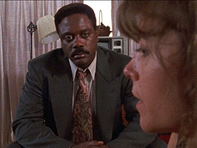A.J. Langer and Howard E. Rollins Jr. in In the Heat of the Night (1988)