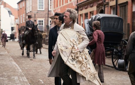 Hugh Laurie and Dev Patel in The Personal History of David Copperfield (2019)