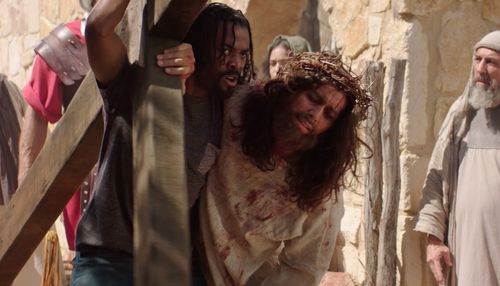 Simon helping Jesus carry the cross. Assassin 33 AD