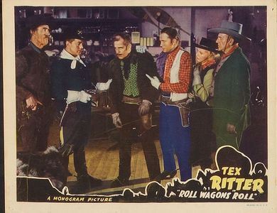 Kenne Duncan, Muriel Evans, Reed Howes, Frank LaRue, Nelson McDowell, and Tex Ritter in Roll Wagons Roll (1940)