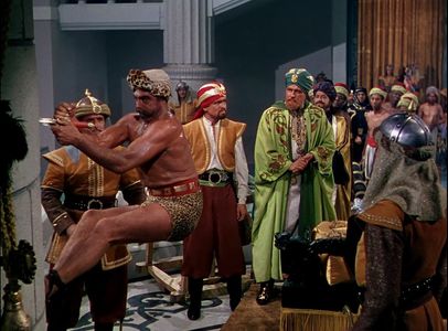 Gene Evans, George Macready, Victor Romito, and Mickey Simpson in The Golden Blade (1953)