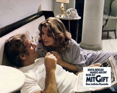Senta Berger and Ron Ely in MitGift (1976)