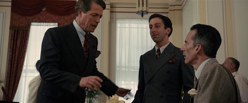 Hugh Grant, James Sobol Kelly and Simon Helberg in Florence Foster Jenkins (2016).