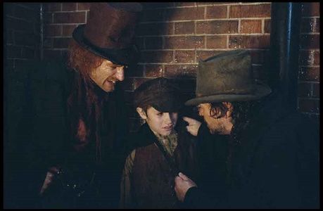 Jamie Foreman, Mark Strong, and Barney Clark in Oliver Twist (2005)