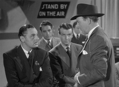 Jerome Cowan, William Gargan, Joe Kirk, and Don Porter in Who Done It? (1942)