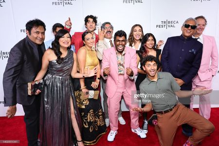 Cast and Crew pose at the 