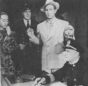 Lloyd Bridges, Arno Frey, Victoria Horne, and Gene Roth in Secret Agent X-9 (1945)