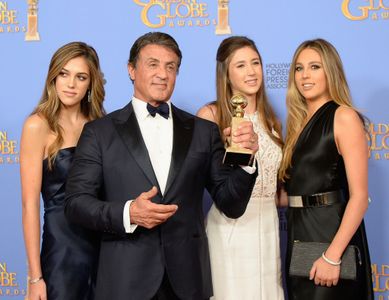 Sylvester Stallone, Sophia Rose Stallone, Sistine Rose Stallone, and Scarlet Rose Stallone at an event for 73rd Golden G