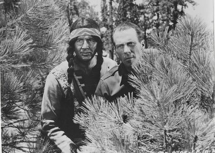 Dennis Moore and Rick Vallin in Perils of the Wilderness (1956)