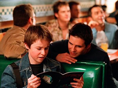 Hal Sparks, Robert Gant, Scott Lowell, and Peter Paige in Queer as Folk (1999)