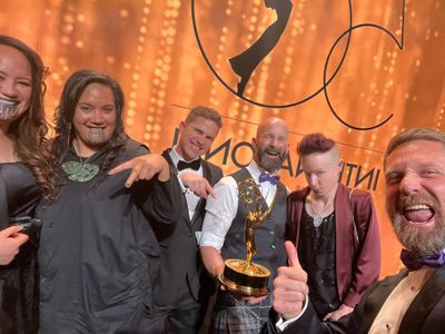 Max Currie [centre] and the Rūrangi team with their 2022 International Emmy for Best Short-form Series