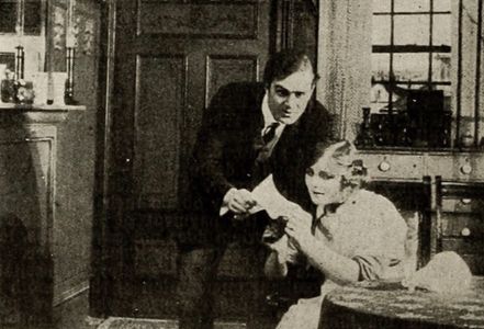 Stewart Rome and Alma Taylor in The Girl Who Lived in Straight Street (1914)