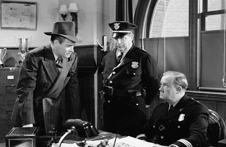 Wade Boteler, Cy Kendall, and Richard Travis in The Last Ride (1944)