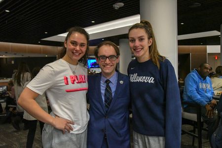 Andrew McKeough (C) with friends Mary Gedaka (L) and Kelly Jekot (R) after one of their basketball games at Villanova Un