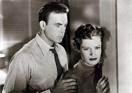 Scott Brady and Alexis Smith in Undercover Girl (1950)